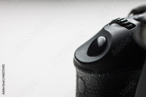 close-up of a dslr shutter release button on isolated background