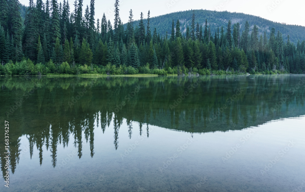Mountain lake in mountains at sunny day British Columbia Canada. Mountain lake in mountains at sunny day British Columbia Canada.