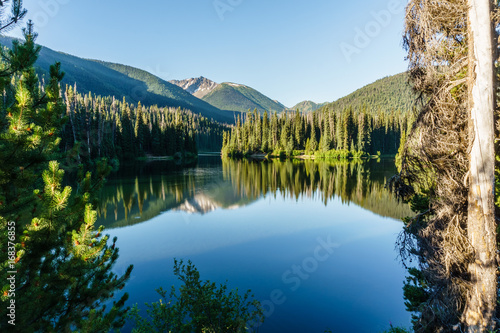 Mountain lake in mountains at sunny day British Columbia Canada.