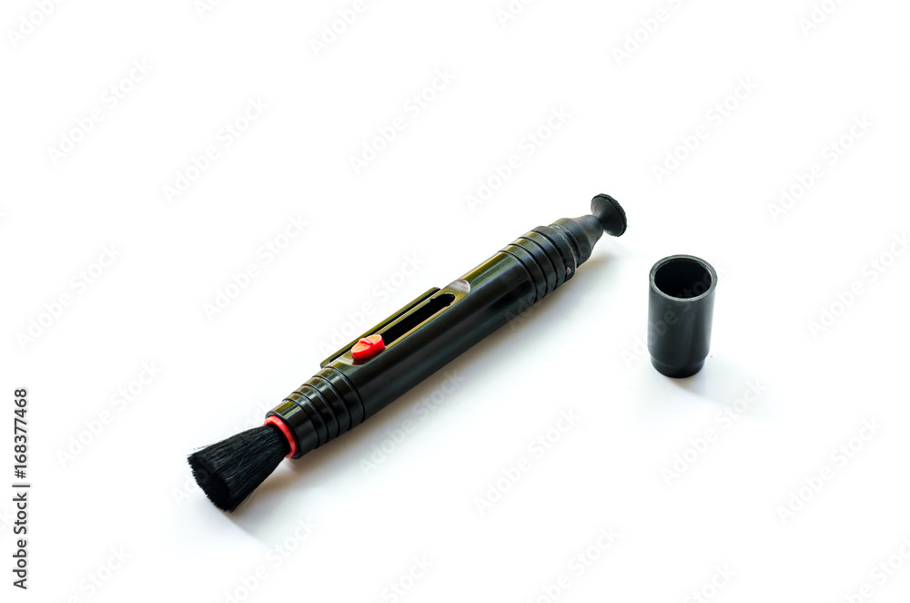 Lenspen for photographer: useful equipment on the white background Lenspen for photographer: useful equipment on the white background