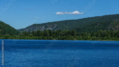 Mountain lake in mountains at sunny day British Columbia Canada. © olegmayorov