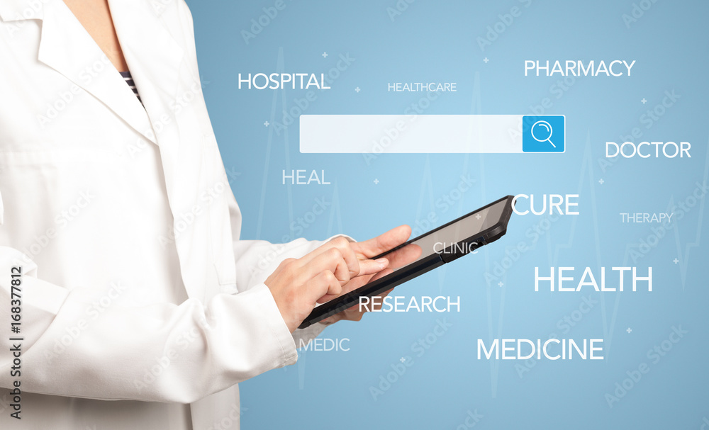Female doctor with tablet Female doctor with tablet