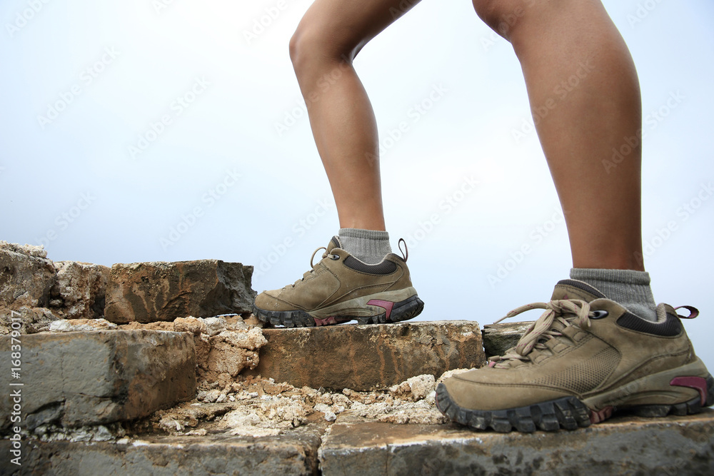 successful woman hiker enjoy the view on the top of great wall successful woman hiker enjoy the view on the top of great wall