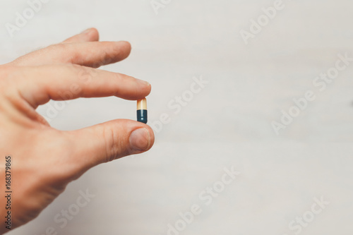 Medicine Pills Or Capsules In Hand, Selective Focus. Drug Prescription For Treatment Medication
