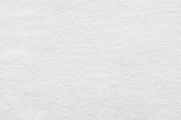White towel texture for background. Flat and smooth with fabric or textile consist of cotton fiber material. Look plush, fluffy, dry, soft and clean. For background of baby, spa, hotel and laundry.