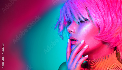 Fotografía Fashion model woman in colorful bright lights, portrait of beautiful party girl