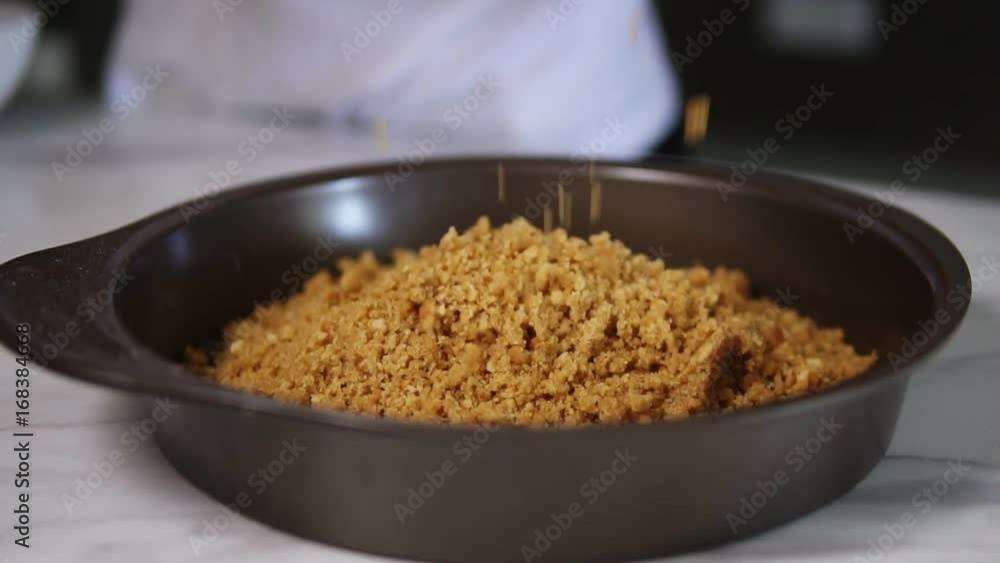 Baking cake. Dough pouring into round baking dish. Cheezecake ingredients. Cake dough pouring in baking pan. Chef pours dough in slow motion. Home baking. Slowmotion shot Baking cake. Dough pouring into round baking dish. Cheezecake ingredients. Cake dough pouring in baking pan. Chef pours dough in slow motion. Home baking. Slowmotion shot