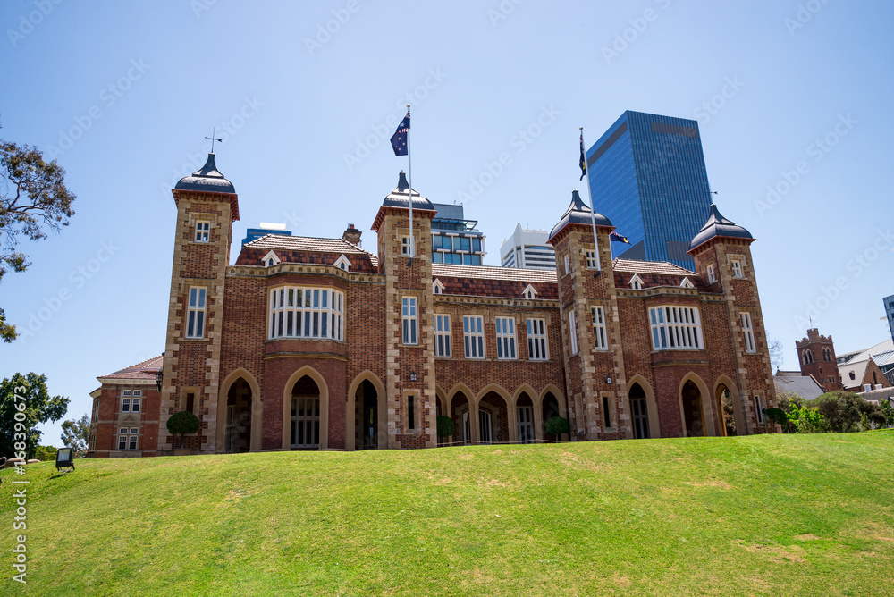 Fototapeta premium A view of Government House with Perth Central Business district buildings on background