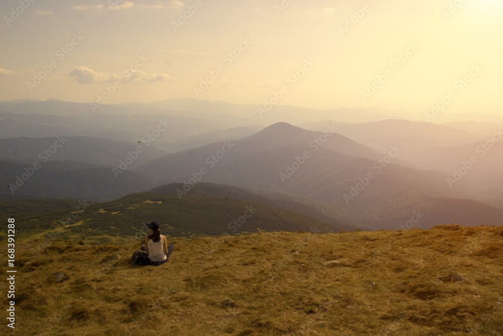 Woman is resting in the mountains, chill out