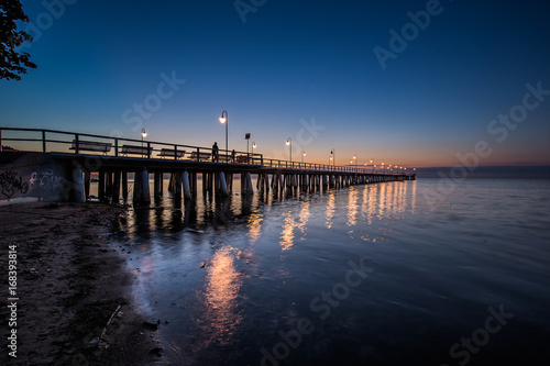 Amazing sunrise on the pier at the seaside. Gdynia Orlowo, Poland © R_Szatkowski