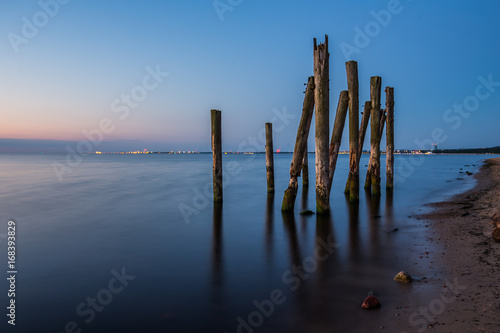 Amazing sunrise on the pier at the seaside. Gdynia Orlowo, Poland © R_Szatkowski