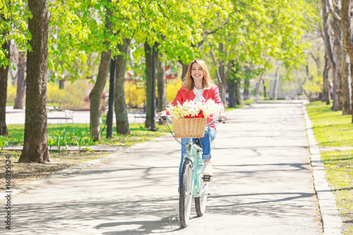 Young beautiful girl riding...