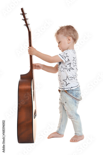 Cute little boy with acoust...