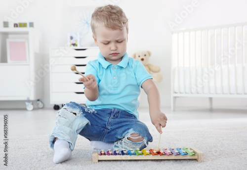 Cute little boy with xyloph...