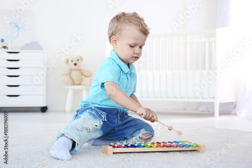 Cute little boy with xyloph...