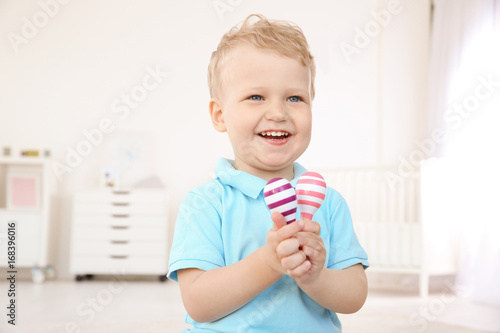 Cute little boy with pair o...