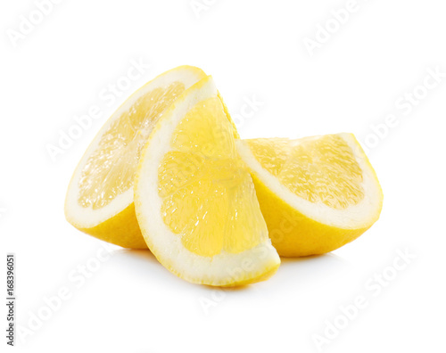 Delicious sliced lemons on white background