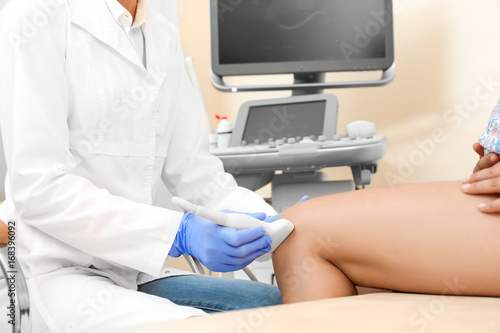 Young woman undergoing ultr...