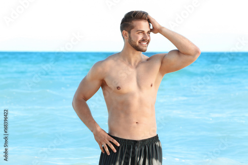 Handsome young muscular man...