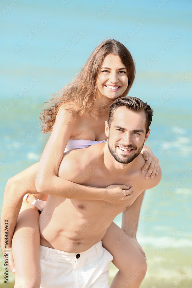 Beautiful young couple at sea resort Beautiful young couple at sea resort
