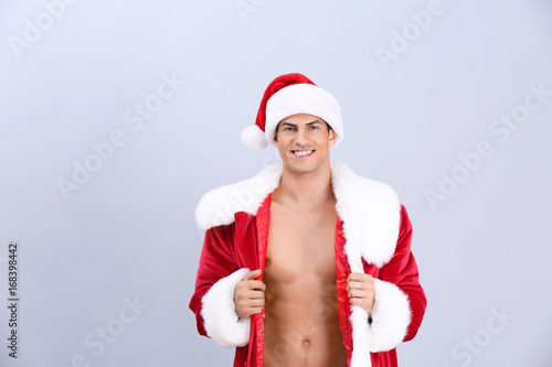 Handsome man in Santa Claus...