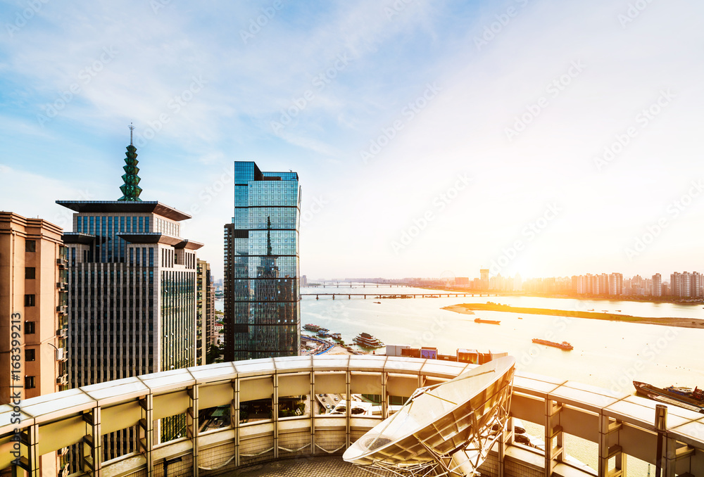Fototapeta premium City during warm sunset