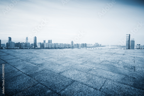 cityscape and skyline of hangzhou new city from brick floor