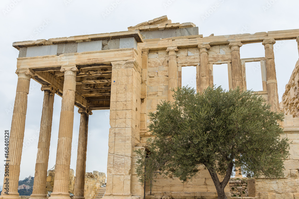 Erechtheion is an ancient Greek temple, on the north side of the Acropolis of Athens in Greece. Erechtheion is an ancient Greek temple, on the north side of the Acropolis of Athens in Greece.