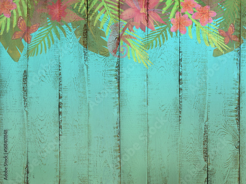 border with tropical jungle pattern on sea blue color wooden background