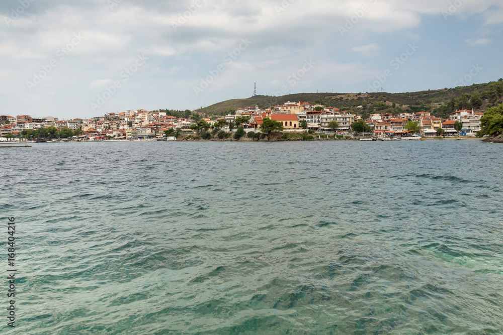 Fototapeta premium Panoramic view of coastline of town of Neos Marmaras at Sithonia peninsula, Chalkidiki, Central Macedonia, Greece