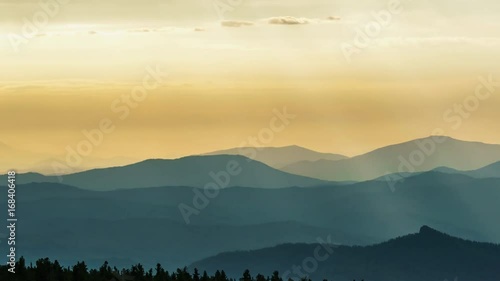 Wallpaper Mural Sun rays at dawn over the mountain range. 4K timelapse Torontodigital.ca