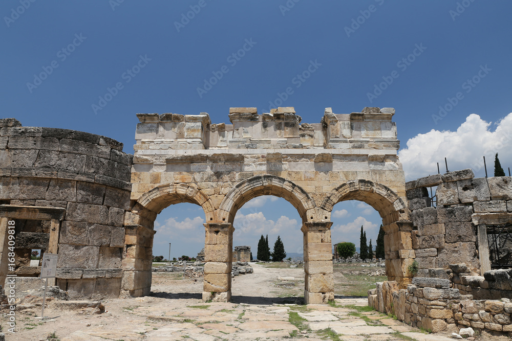 Frontinus Gate and Street in Hierapolis Ancient City, Turkey Frontinus Gate and Street in Hierapolis Ancient City, Turkey