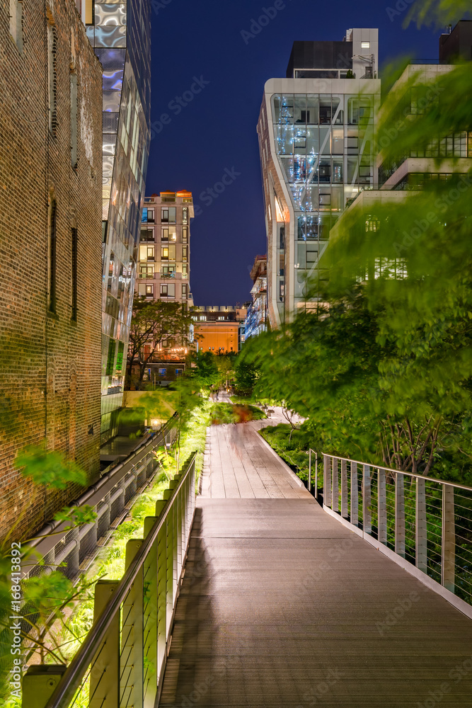 The High Line promenade at night in the heart of Chelsea. Manhattan, New York City The High Line promenade at night in the heart of Chelsea. Manhattan, New York City