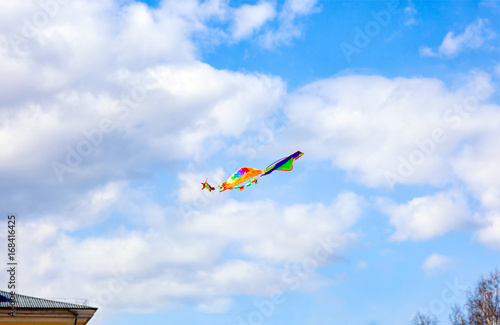 Multicolored kite flying in sky