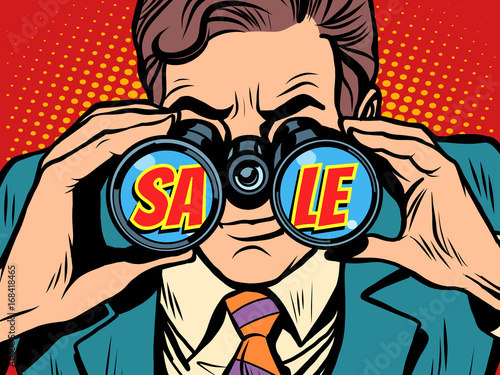 Sale Businessman looking through binoculars