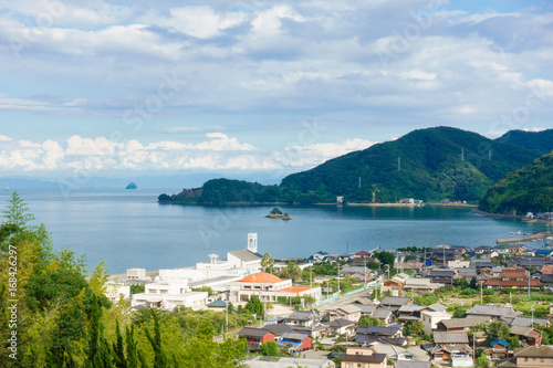 Wallpaper Mural A small city and islands under the blue sky beside of Setonaikai sea in Ehime, Japan Torontodigital.ca