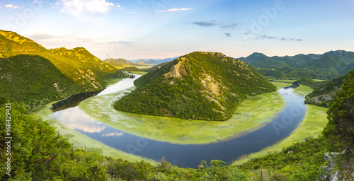 Fototapeta Naklejka Na Ścianę i Meble -  bend of the river flowing into Lake Skadar, Montenegro