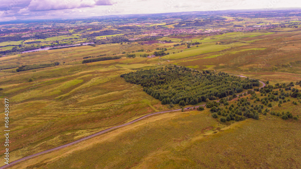 Aerial view of moorland with  forestry plantations 
