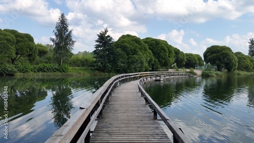 Curved wooden walkways across the lake