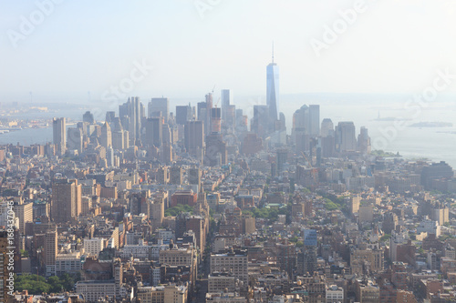 Panoramic view of Lower Manhattan as seen from the Empire State Building observation deck in the late afternoon (New York, USA)
