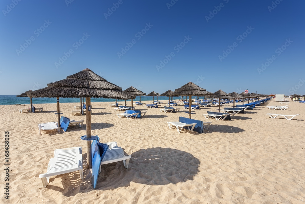 Summer morning on the beach island of Tavira. Portugal, Algarve.