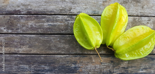 Starfruit on board, writing board, rough wood, sign, chalkboard