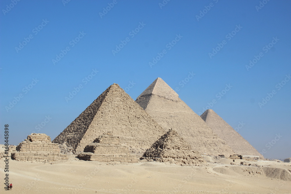 The full view of the three pyramids of Giza khufu khafre and cheops in Egypt The full view of the three pyramids of Giza khufu khafre and cheops in Egypt