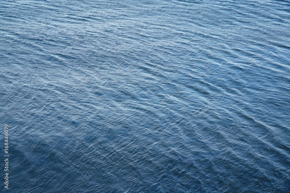 Obraz premium dark blue rippled sea surface