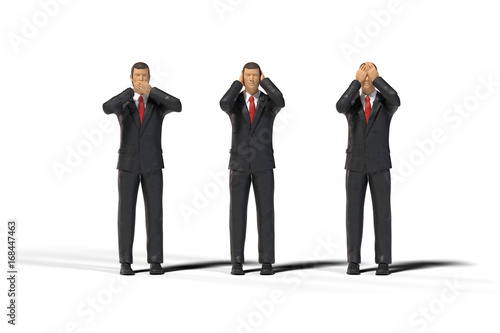 3 miniature figure businessmen in a three wise monkeys pose isolated on white background (see no evil, hear no evil, speak no evil)
