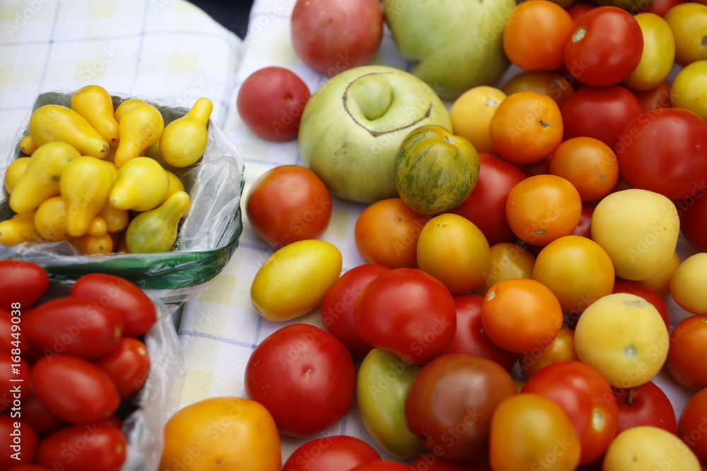 Heirloom tomatoes for sale during the Saturday Farmers Market Heirloom tomatoes for sale during the Saturday Farmers Market