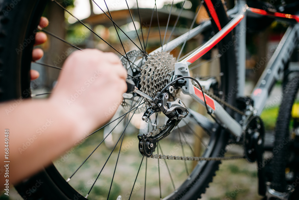 Fototapeta premium Bicycle mechanic repair bike, cycle workshop