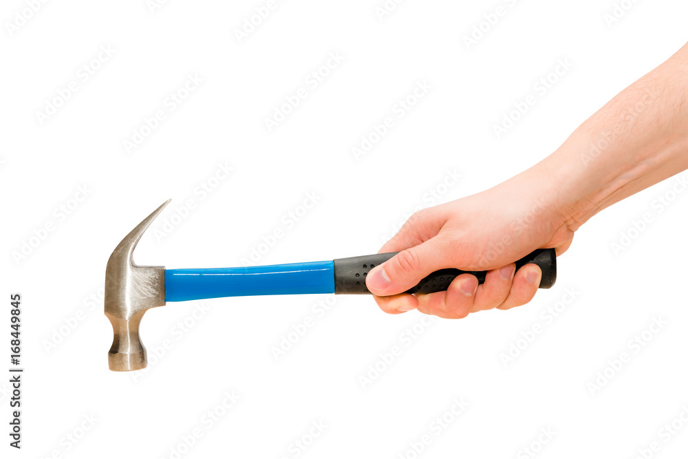 Hand holds hammer in action to hit isolated on white background Hand holds hammer in action to hit isolated on white background