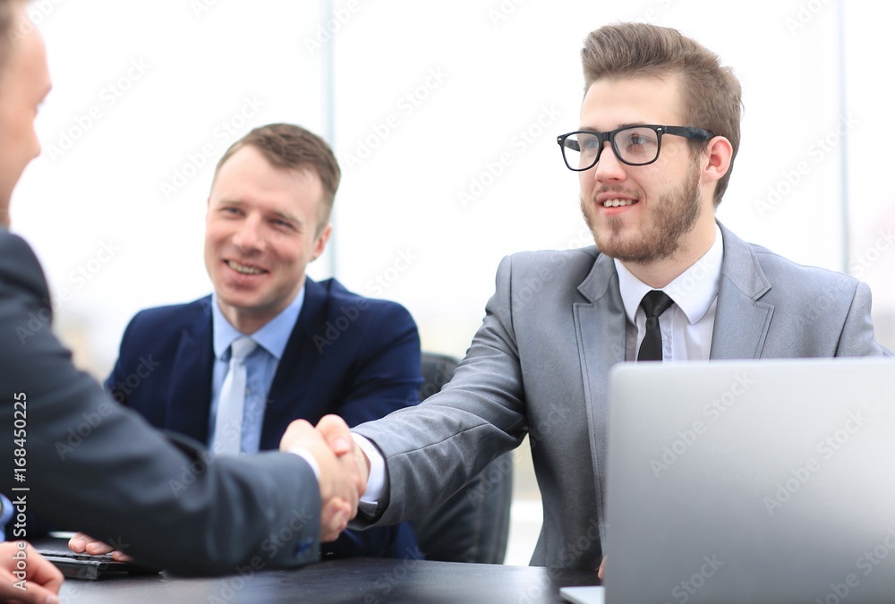 closeup. handshake Manager and the client. closeup. handshake Manager and the client.