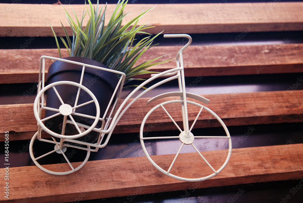 floral decoration, , decoration. Toy bike with basket